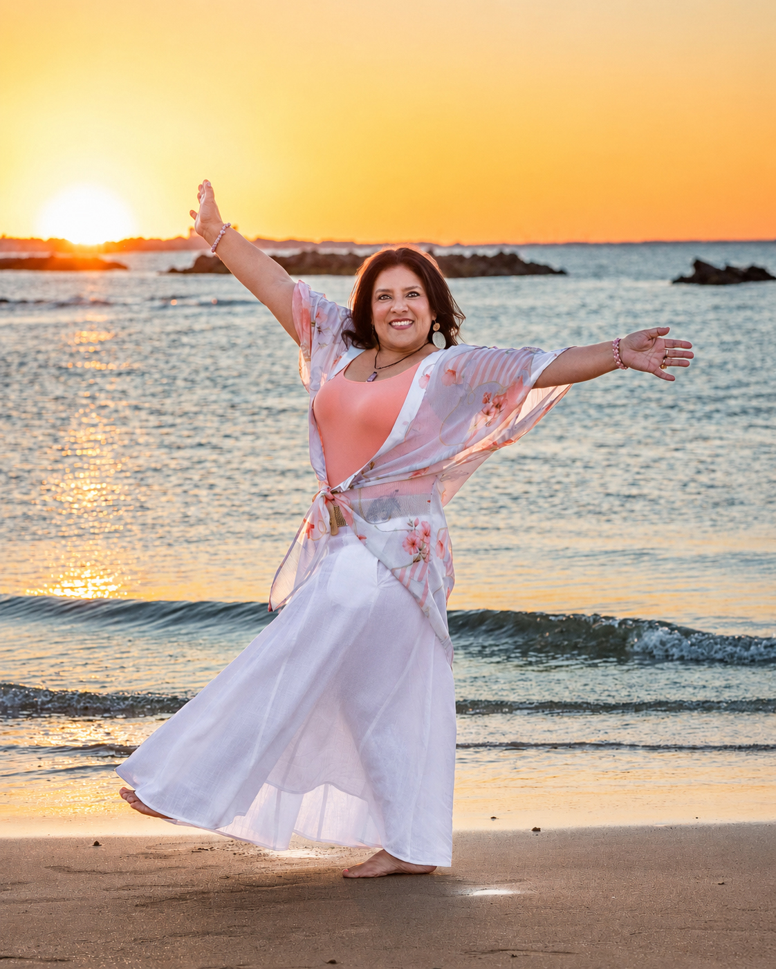 Cynthia of Light Body Holistic standing on the beach